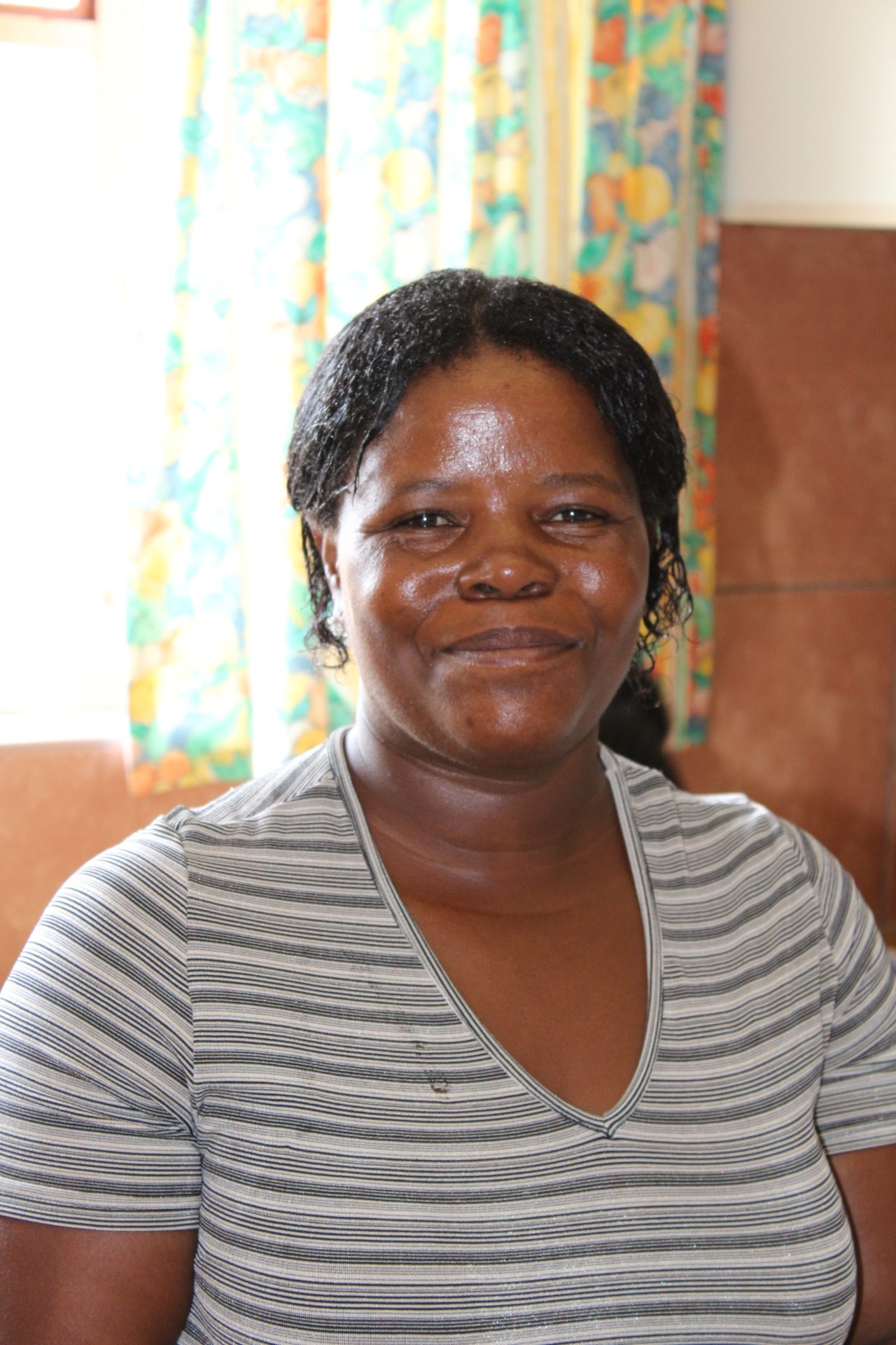 Photo of Poppie, the housekeeper at Degnos Centre in Luiperdheuwel